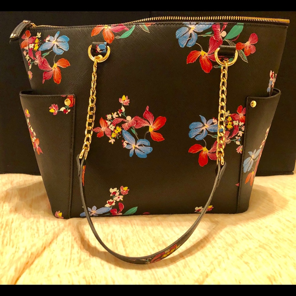 Black and gold tote purse with flowers